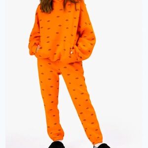 Adika orange Women's Eyeballs Fleece Sweatpants Size (L)Soft Cozy Streetwear